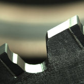 Carbide tooth of a thin kerf metal cutting blade (TK saw blade) 